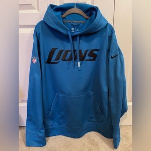 NFL Detroit Lions hoodie. The blue is perfect like the first photo. Size XL